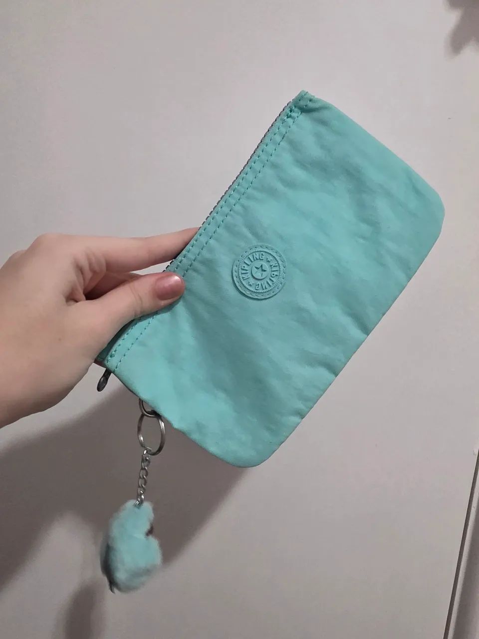 Bolsinha de mão verde água Kipling Original