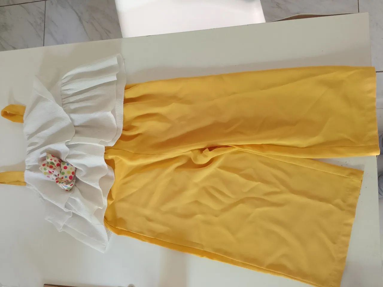 Conjunto amarelo e branco com laço  - Foto 2