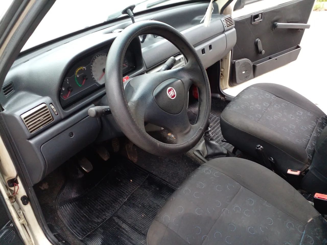 Fiat Uno Mille 1.0 Fire/ F.flex/ Economy 4P 2009 - Foto 9