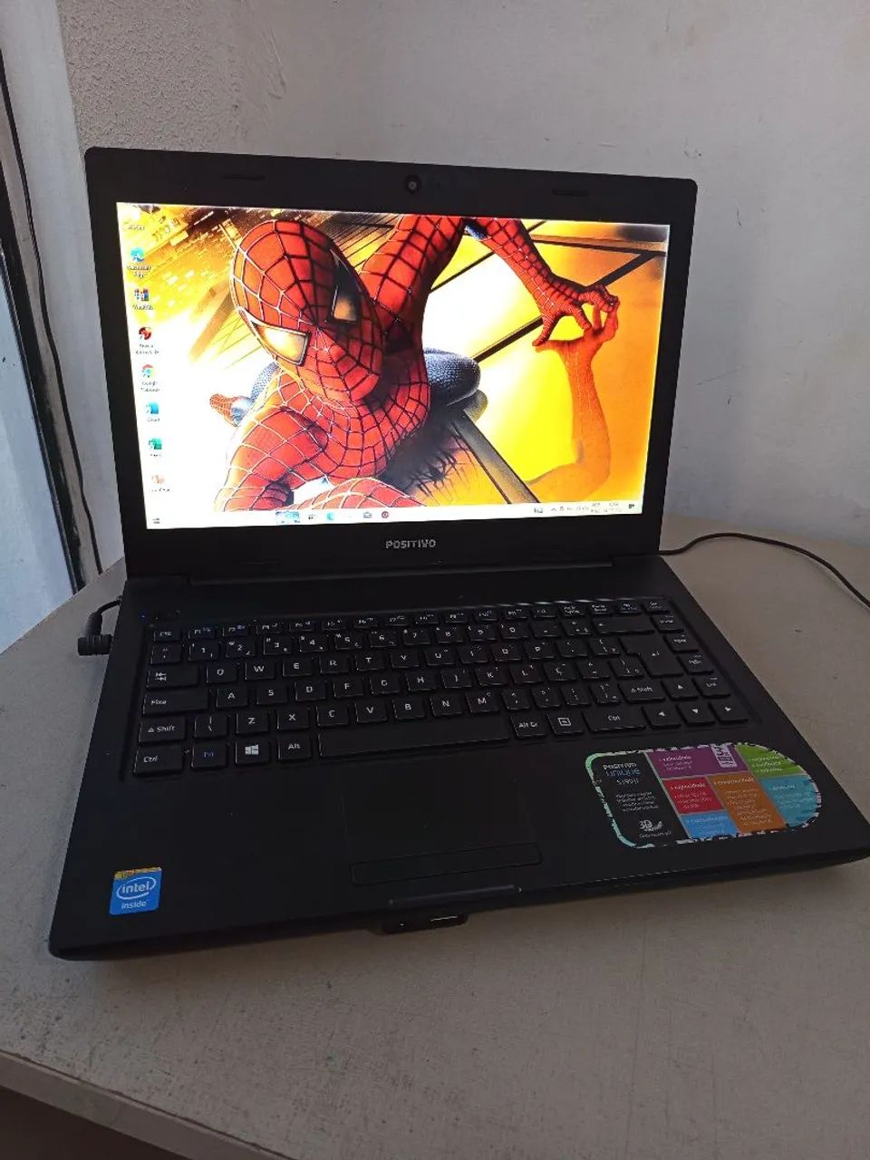 Notebook positivo bateria viciada funcionando 