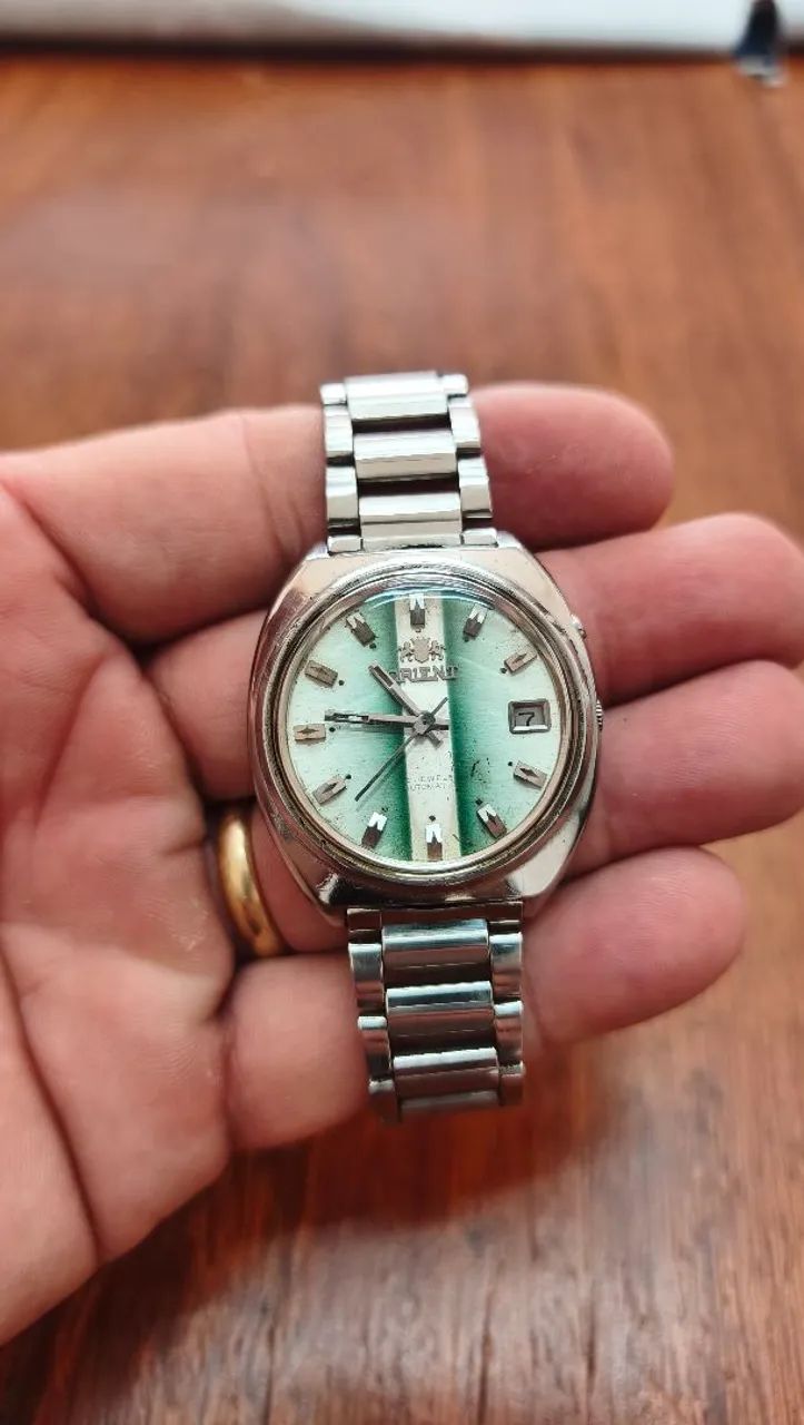 Relógio Orient Automático Vintage Prata com verde degradê e detalhe retangular no centro  - Foto 4