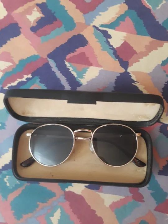 óculos rayban em formato oval