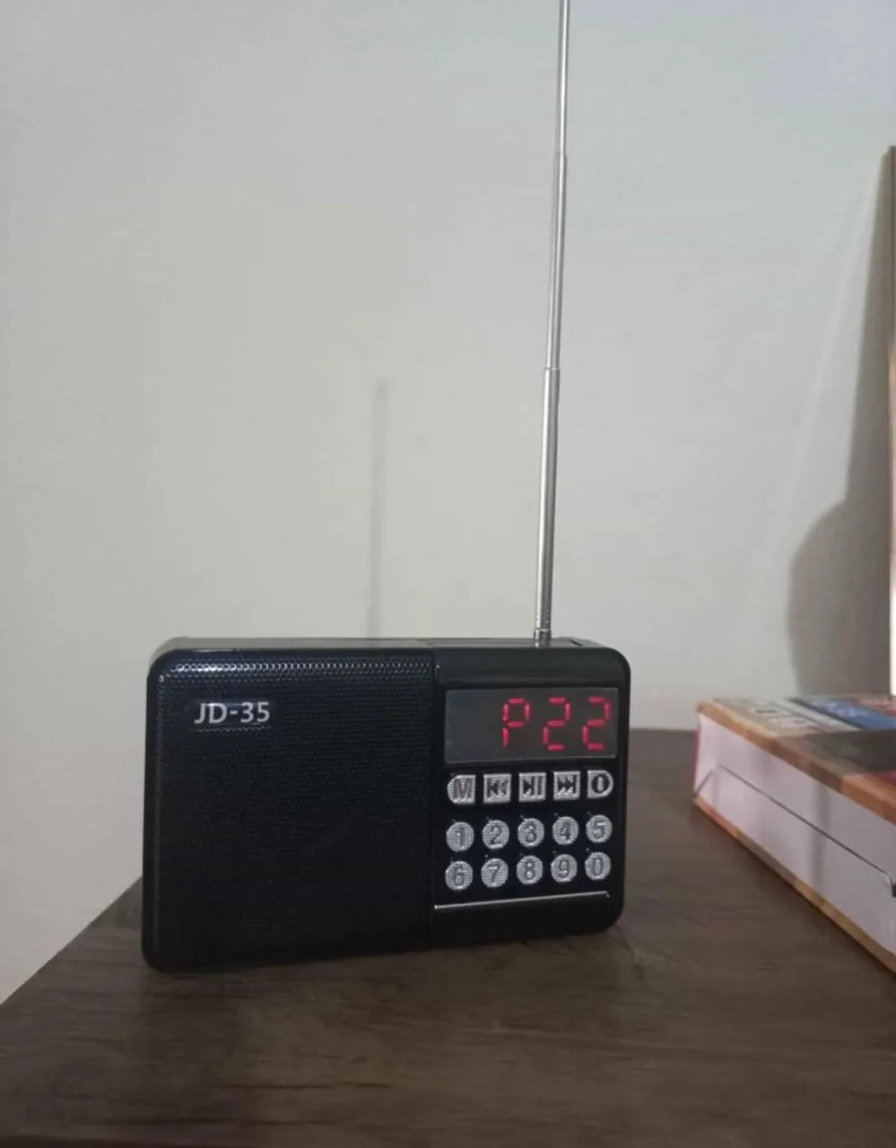 Rádio FM e caixinha de sim bluetooth