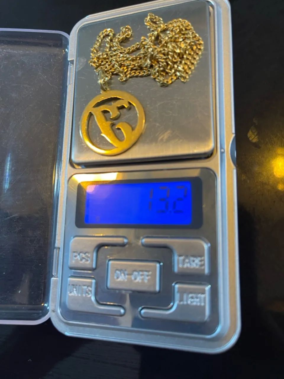 CORDÃO, PINGENTE E PULSEIRA DE OURO 23.1GRAMAS