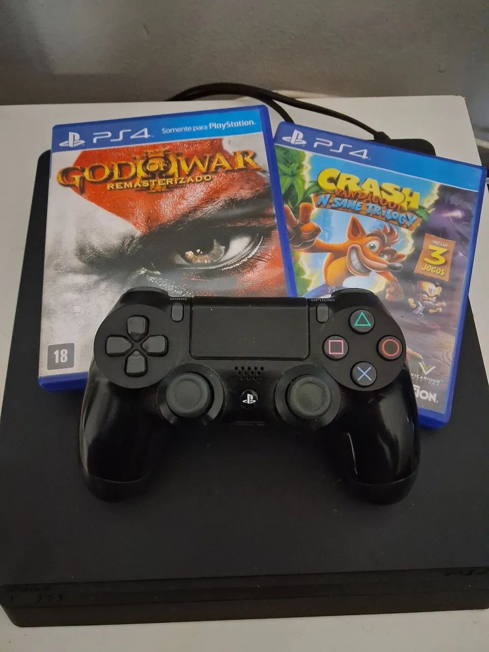 PS4 SLIM 500GB + 2 jogos e controle usado - Foto 3
