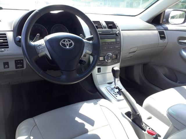 Toyota Corolla XEI automático, couro, completo, super novo - Foto 10