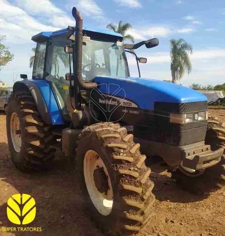 Trator New Holland TM 135 ano 2002.