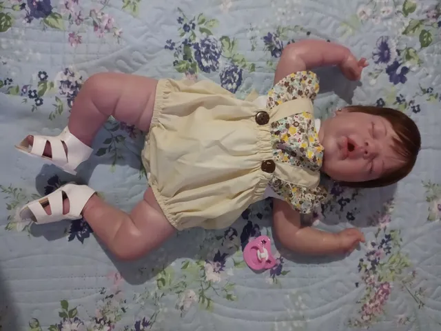 Boneca Bebê Reborn vestido bailarina cabelo fio a fio 100% vinil