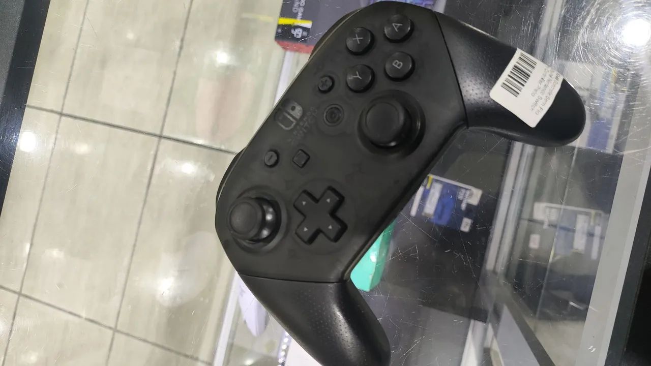 Controle Pro sem fio Nintendo Switch Seminovo 65734679760642120
