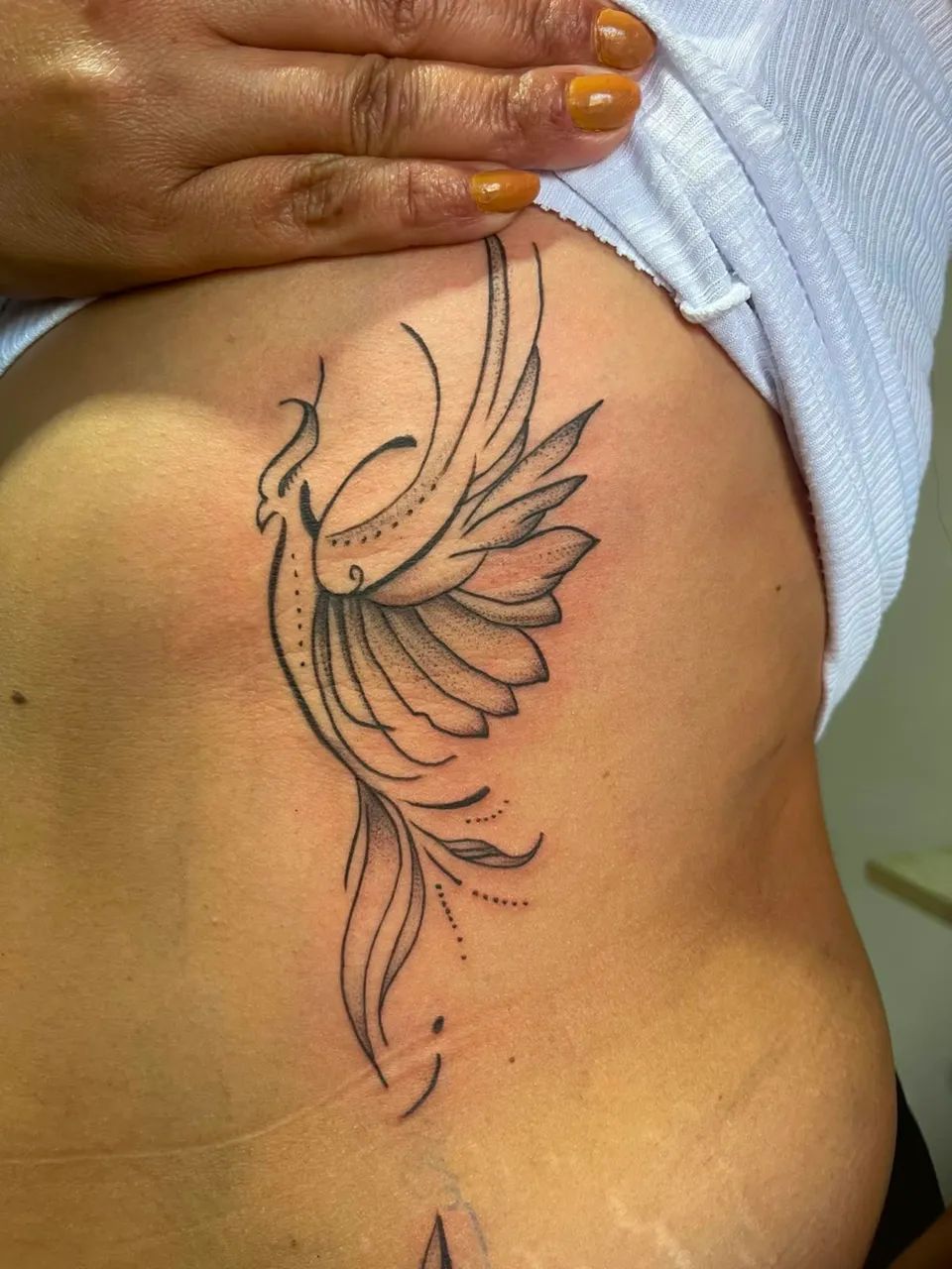 Tatuagem laranjal 