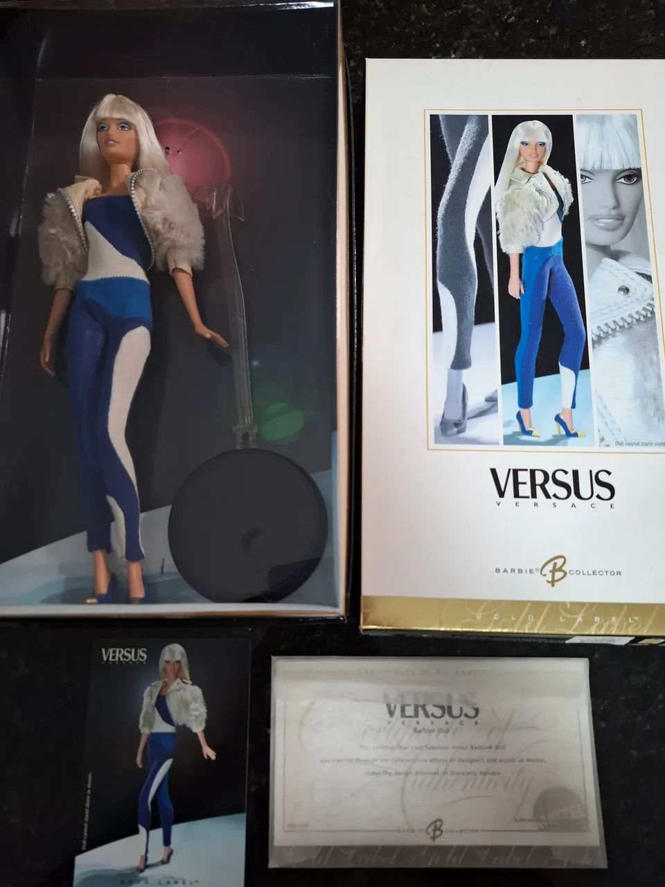 Barbie collector versus versace