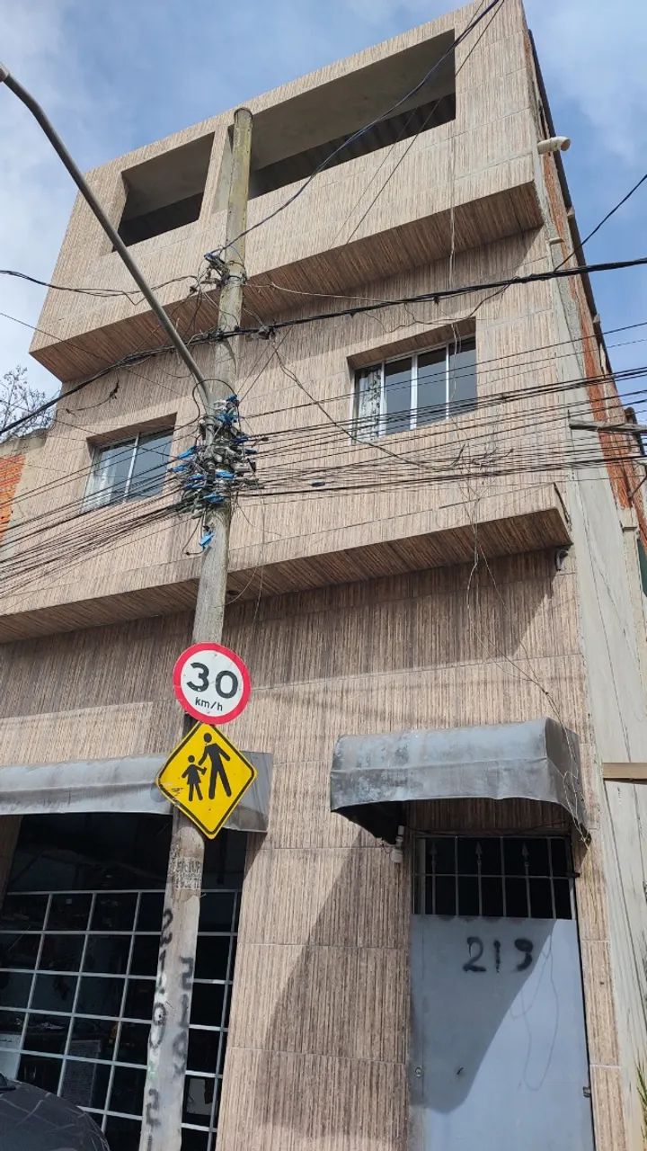 Sobrado com 06 casas e um salão coml - Foto 2