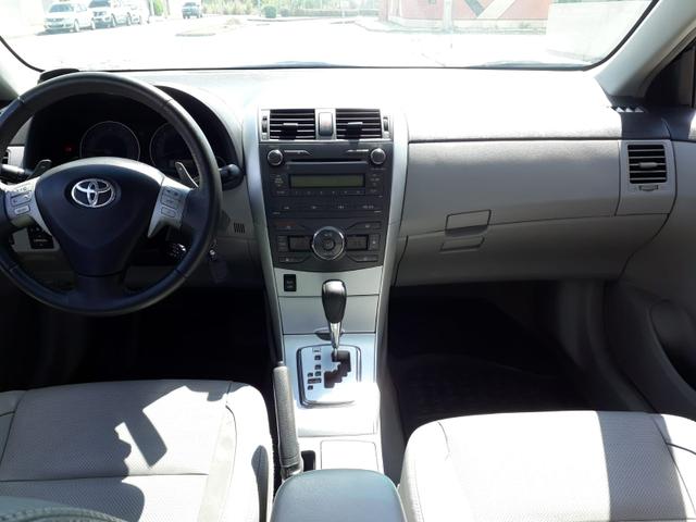 Toyota Corolla XEI automático, couro, completo, super novo - Foto 9