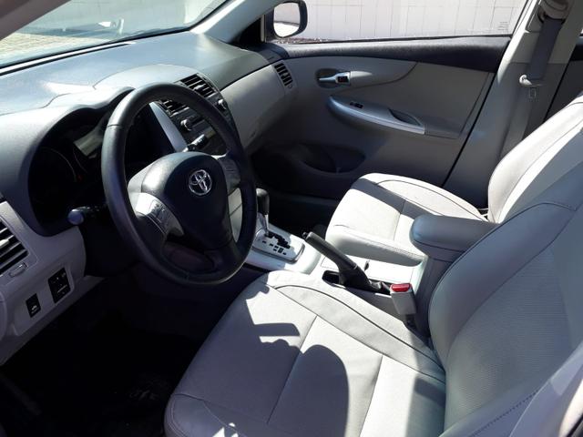 Toyota Corolla XEI automático, couro, completo, super novo - Foto 8