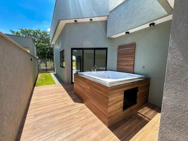 Excelente casa térrea com 3 suítes Sendo uma master com Armários. - Foto 8