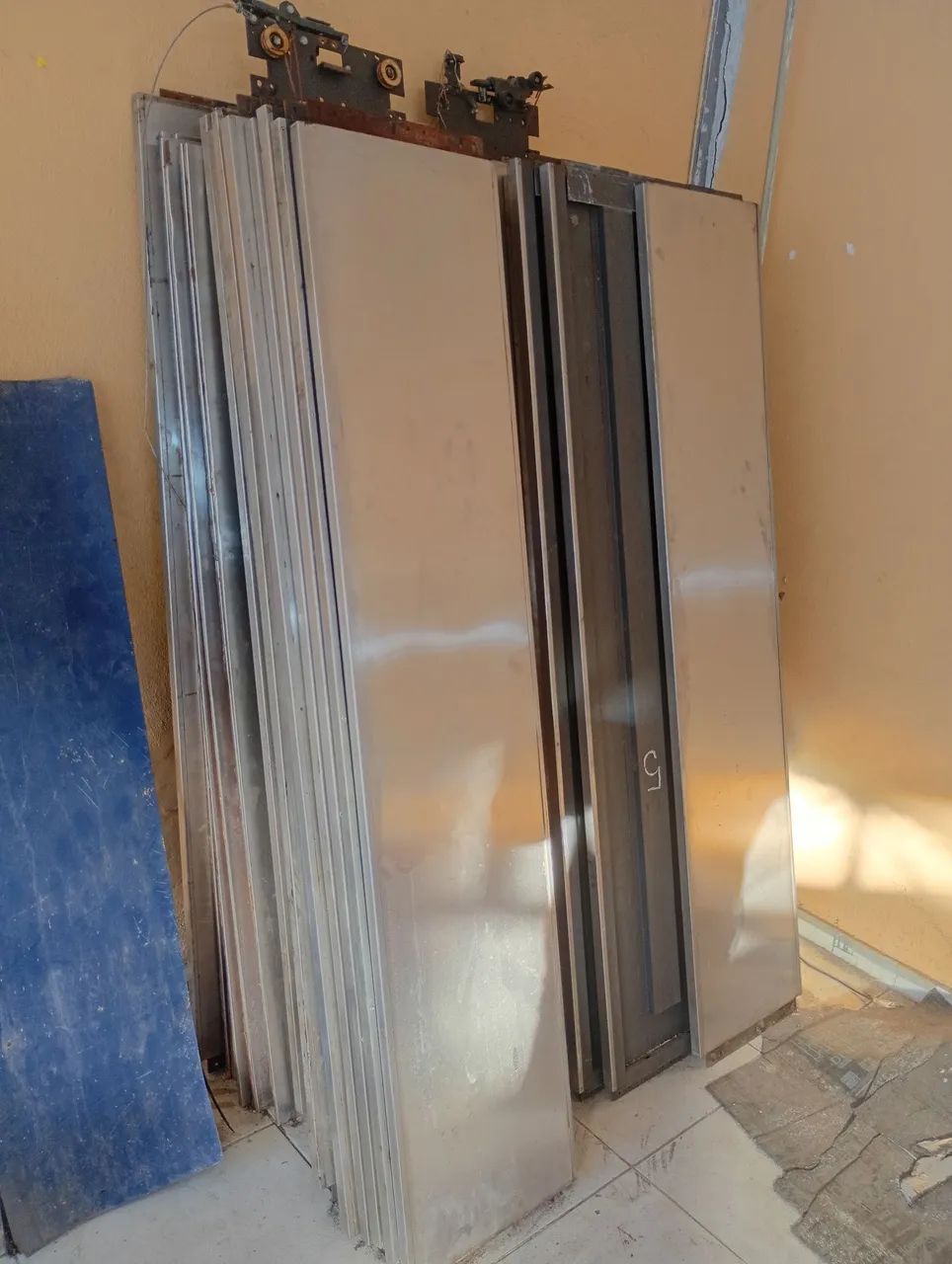 Stainless steel elevator doors are used for various purposes; unit price is $90 — just call *71