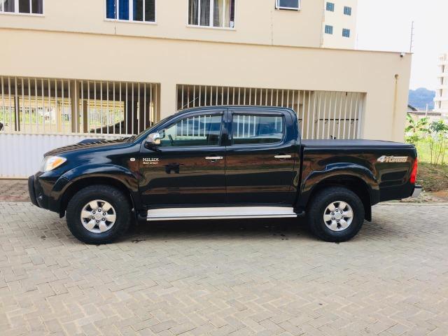 Hilux srv 3.0 cambio manual ano-2008/08