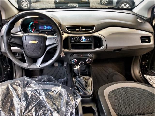 Gm - onix completo baixa km,1 dono,dh,ac,vte,air bag,dvd,estepe s/ uso,impecavel,placa a - Foto 3