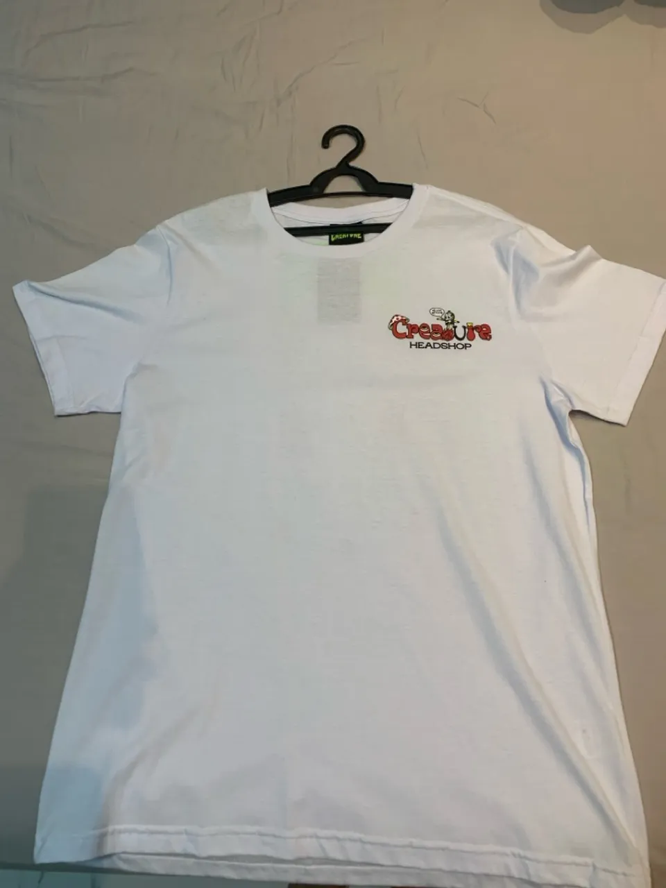 Camiseta Creature original, nova e com etiqueta.