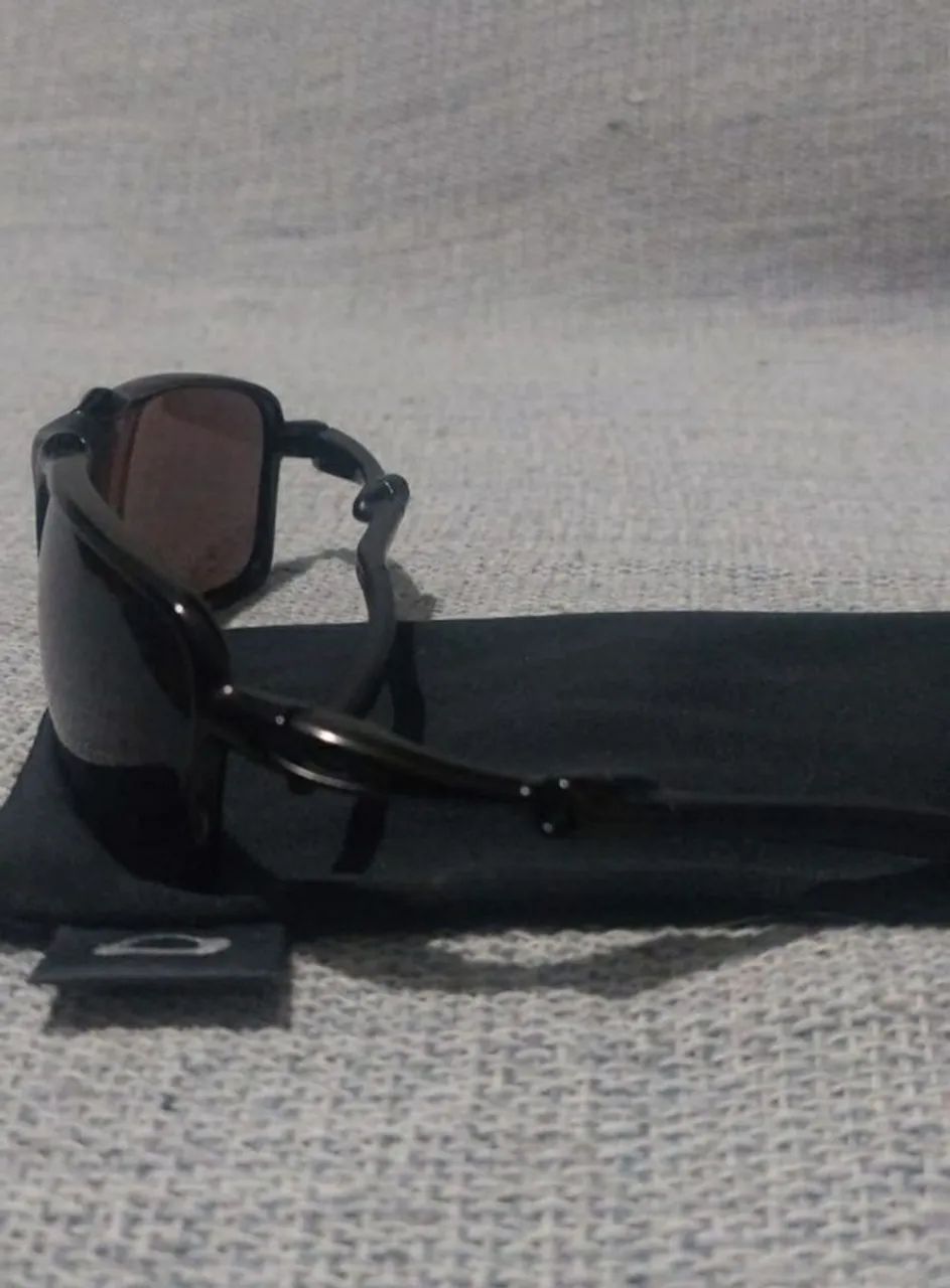 Óculos Oakley Badman OO6020-06 Dark Carbon / Prizm Daily Polarized Óculos Oakley Badman OO6020-06 Dark Carbon / Prizm Daily Polarized