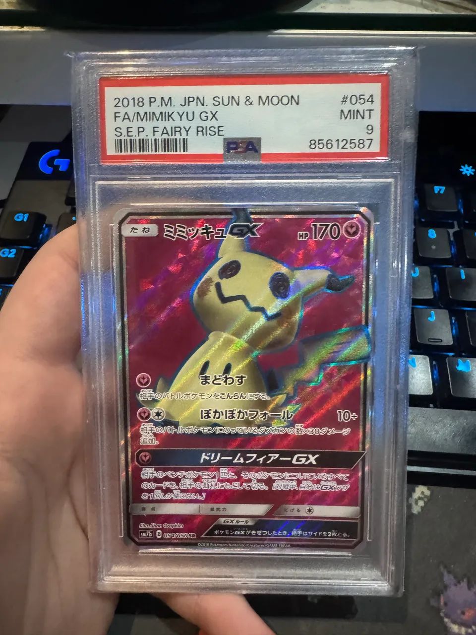 Carta Mimikyu Pokémon Graduada