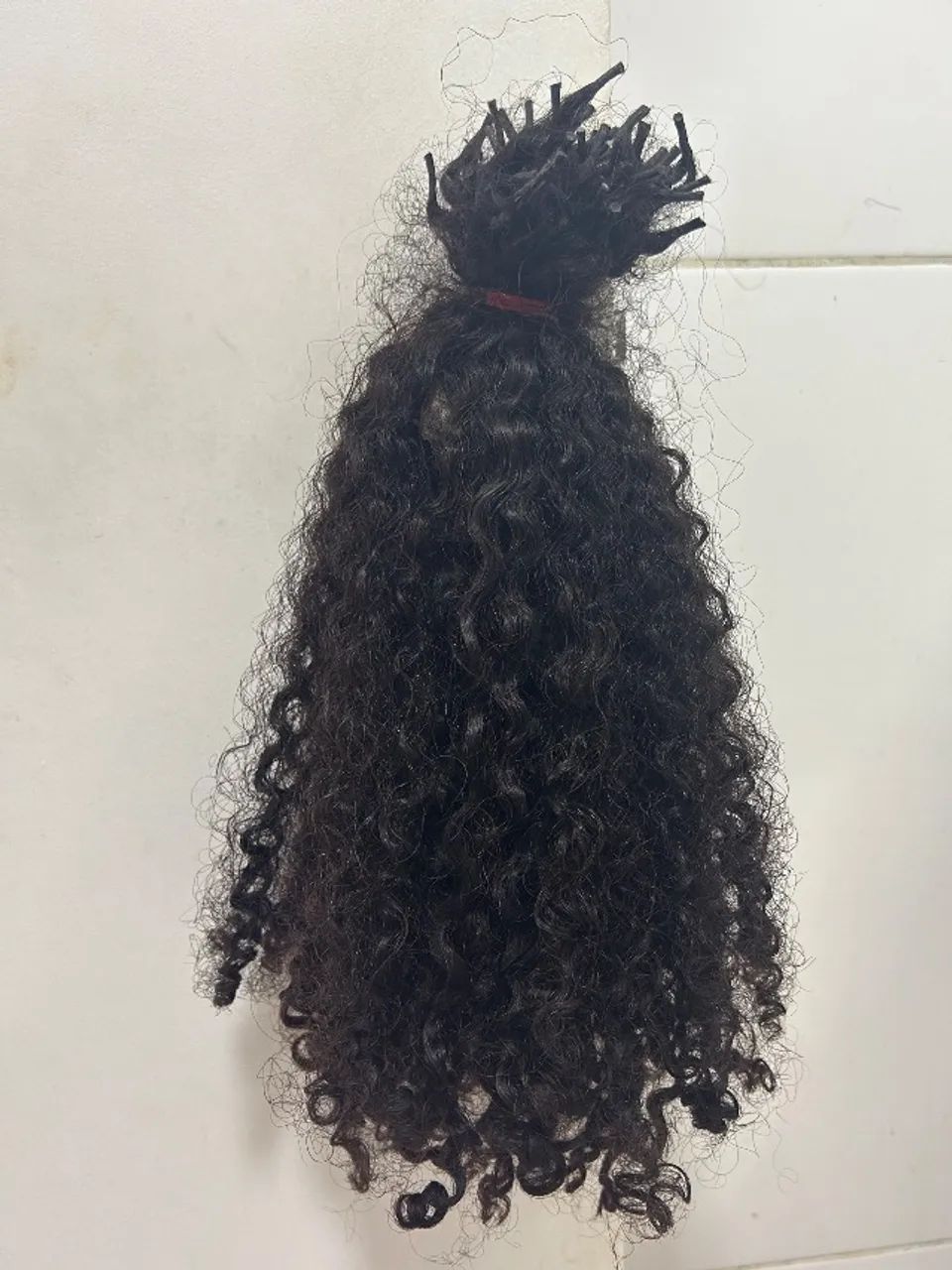 Cabelo cacheado humano