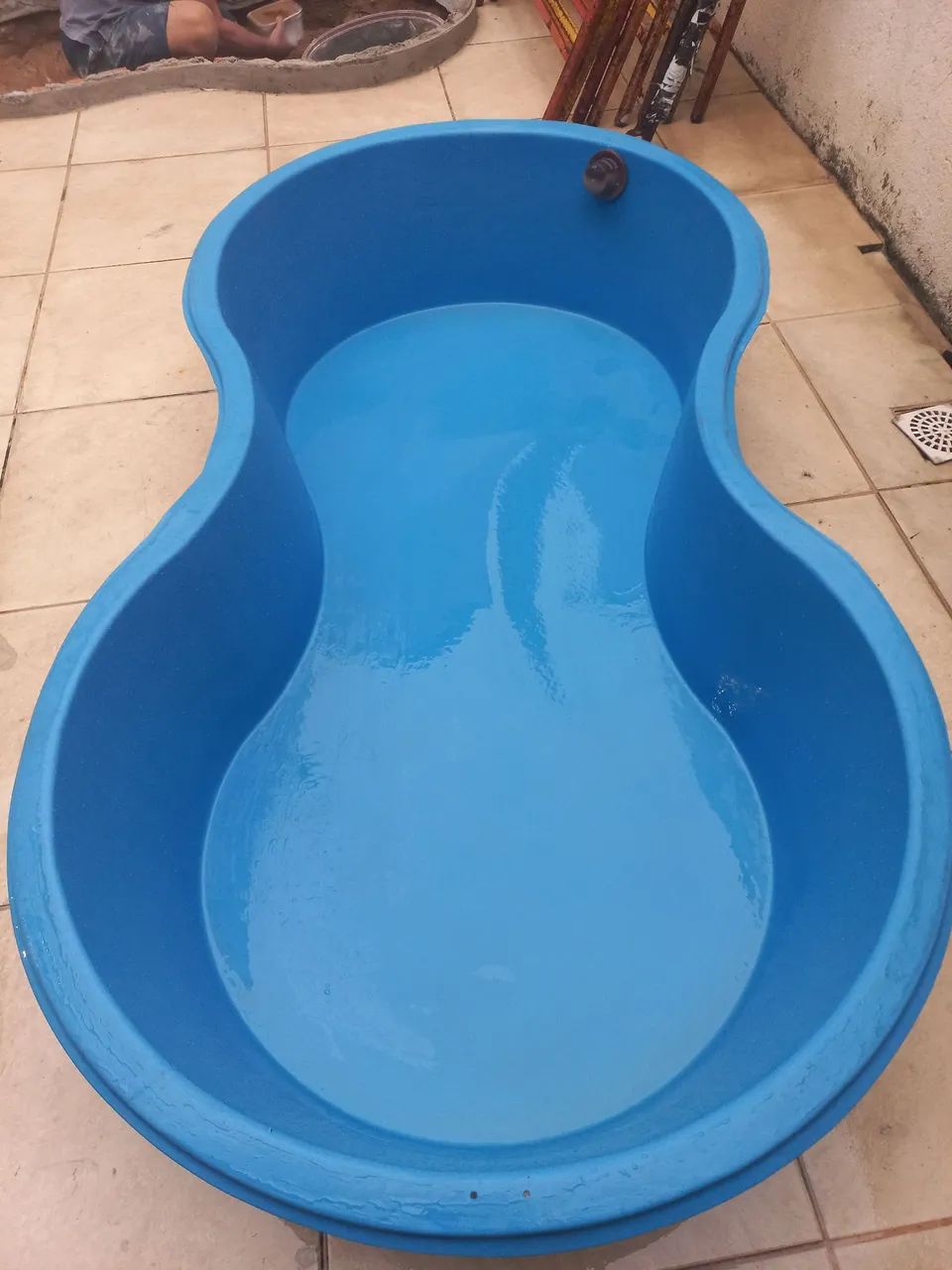 Piscina em formato feijão 