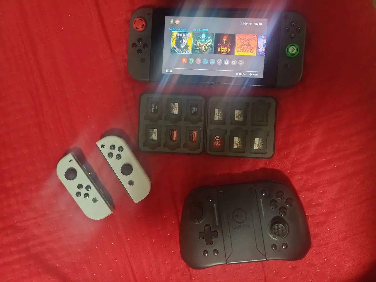 NINTENDO SWITCH 1 - V2 + CASE E CARTÕES DE MEMÓRIA 