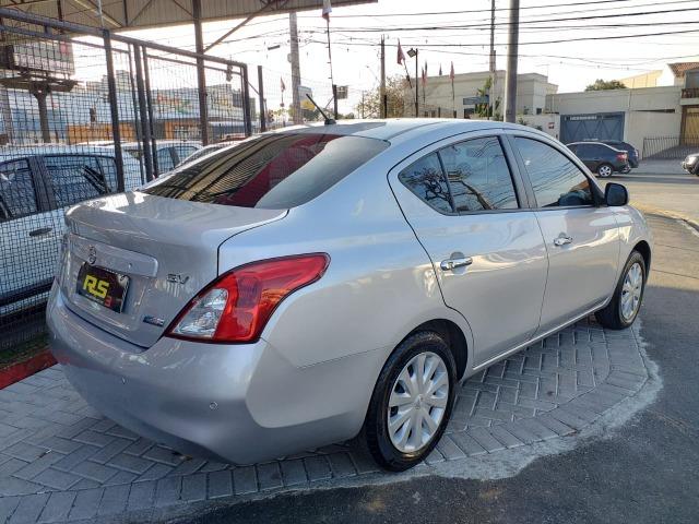 Nissan Versa - Foto 8