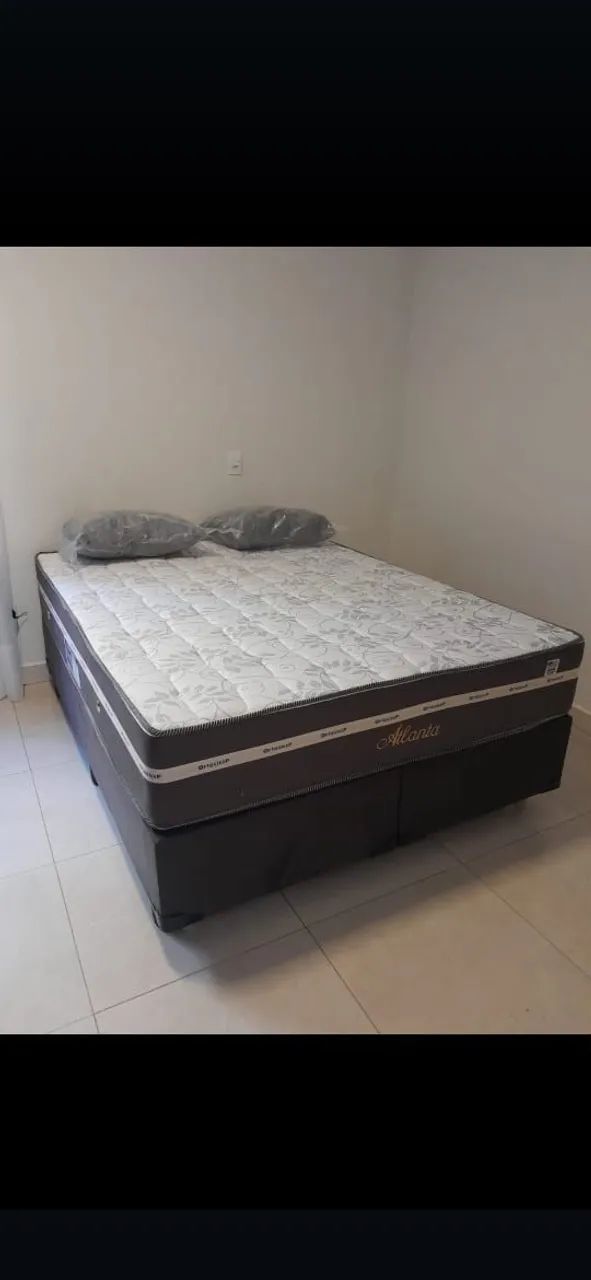 Colchão ortopédico com a base casal