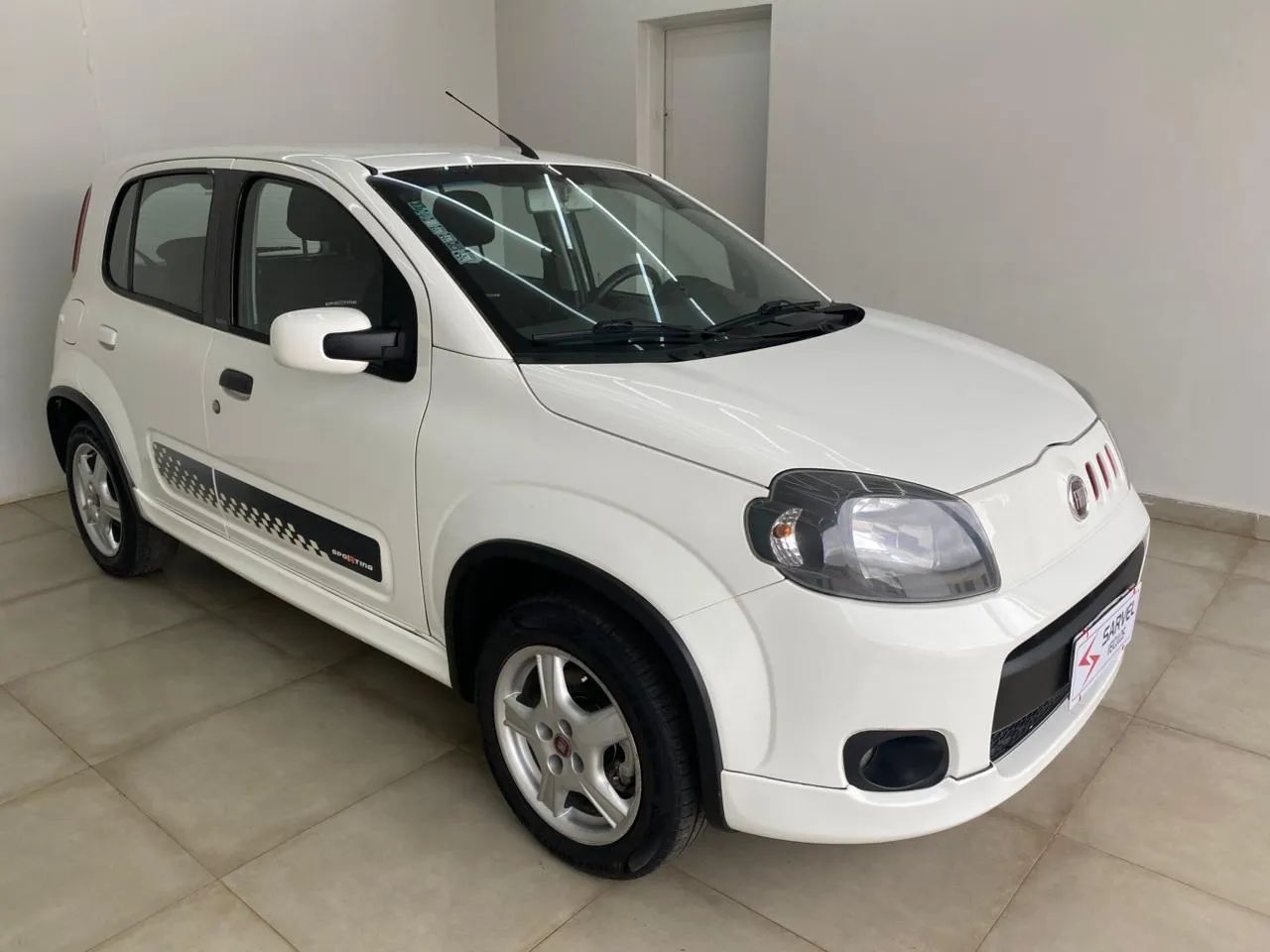 Fiat Uno Sporting 1.4 EVO Fire Flex 8V 4P 2013 - Foto 3