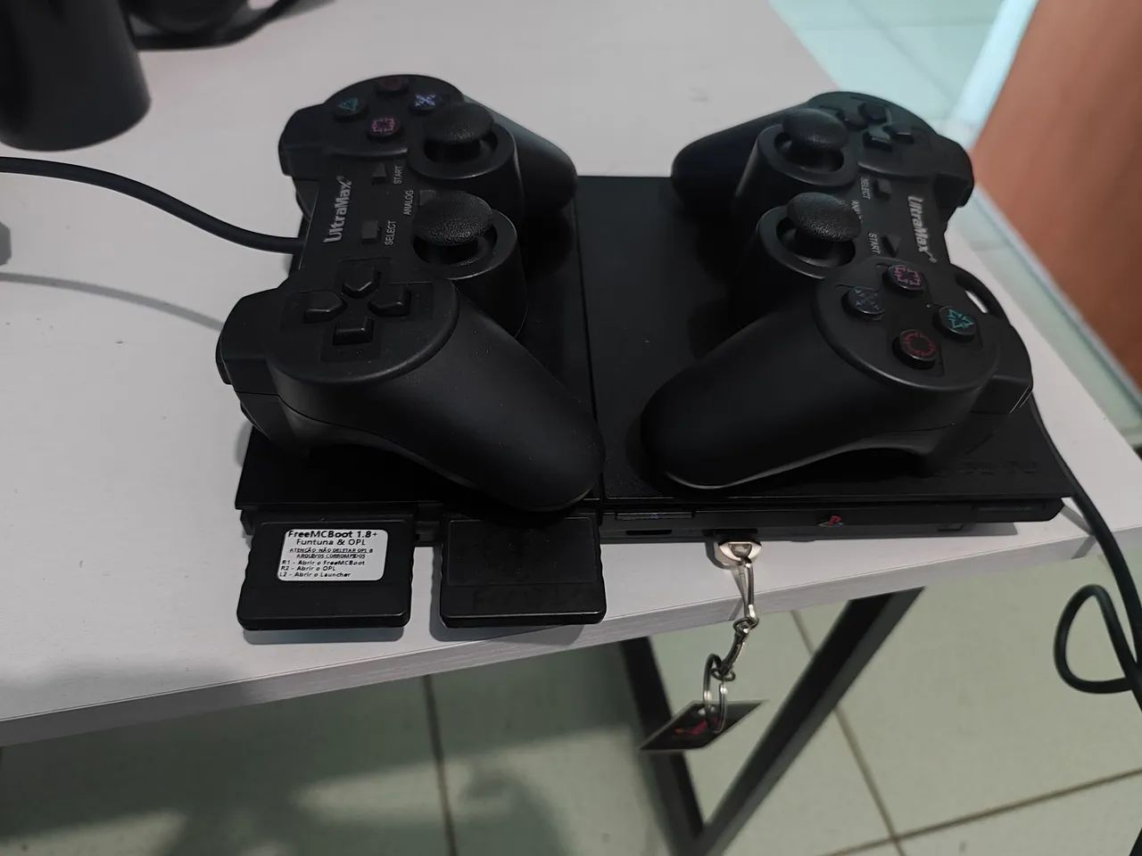 PS2 slim com pen drive com 120 jogos