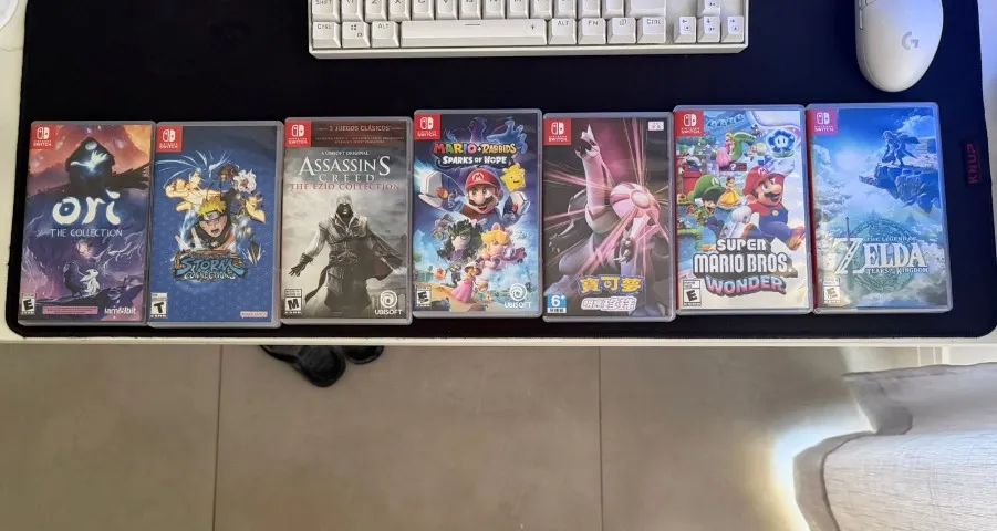 Nintendo Switch Oled + 7 jogos mídia física. - Foto 2
