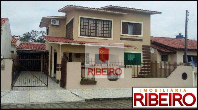 Casa com 4 dormitórios à venda, 180 m² por R$ 600.000,00 - Coloninha - Araranguá/SC