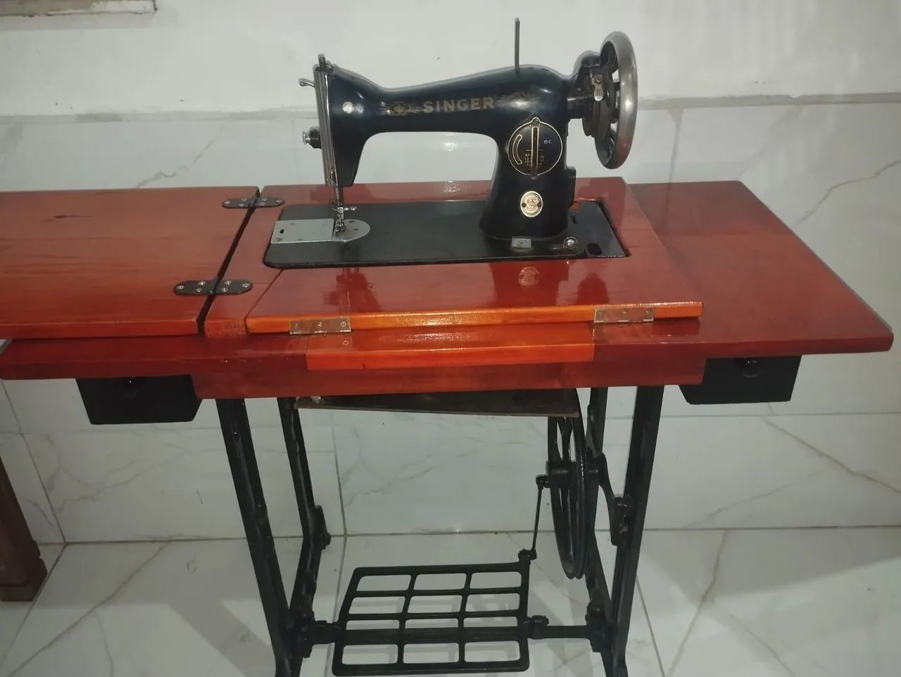 cabeça preta Singer