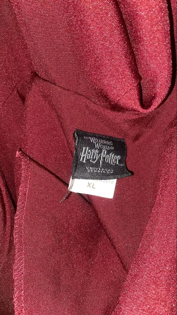 Capa Grifinoria Harry Potter oficial do parque Universal Studios Nova