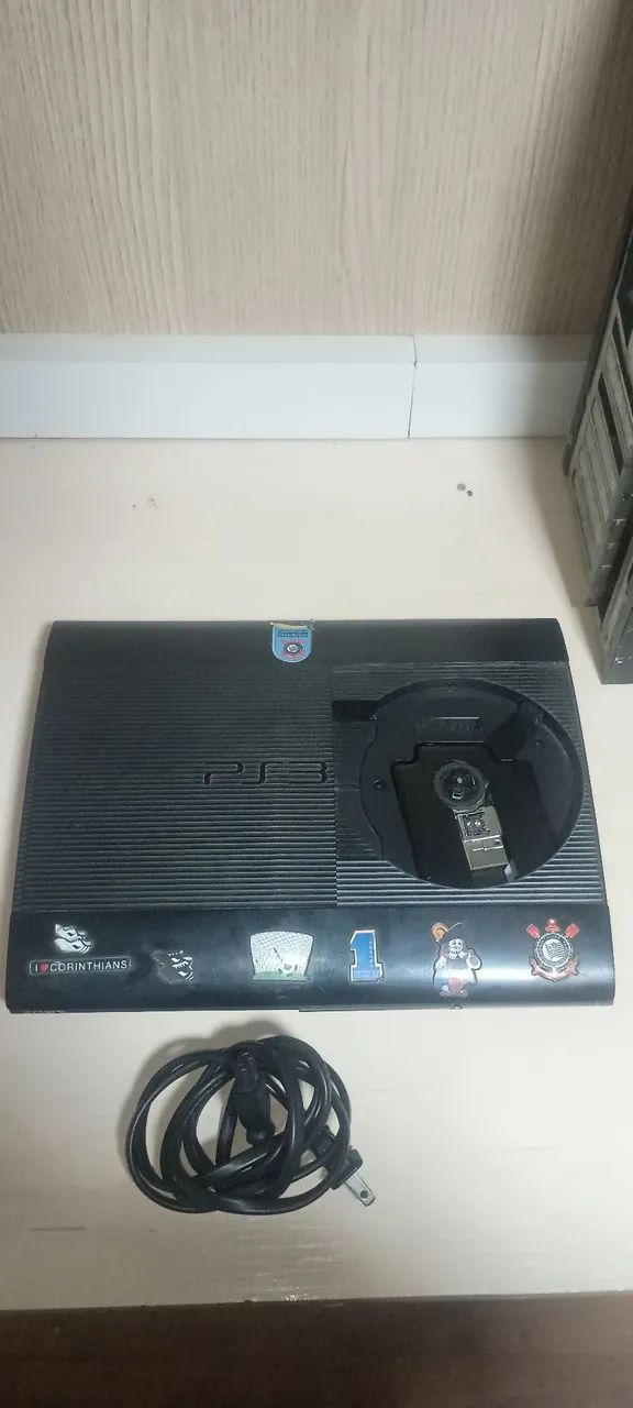 Playstation 3 Super Slim 250gb Preto + 11 jogos  - Foto 3