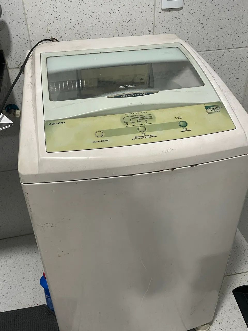 Máquina de lavar com defeito 