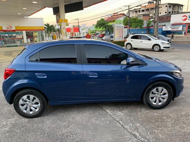 Onix modelo novo lt com my link 10 mil de entrada - Foto 5