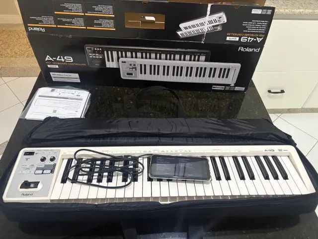 Teclado Controlador Roland A-49 - NOVÍSSIMO + Celular Samsung - Foto 2
