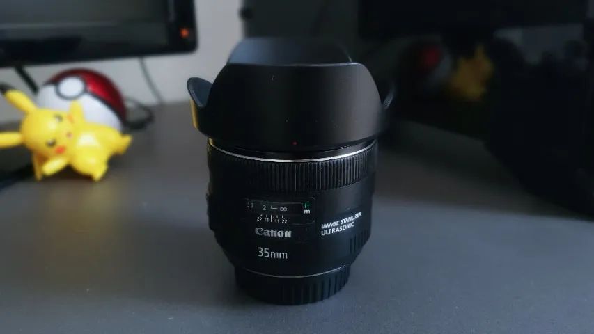 Lente Objetiva Canon EF 35mm Is Usm + Parasol + Filtro Protetor Uv Neutro  - Foto 2