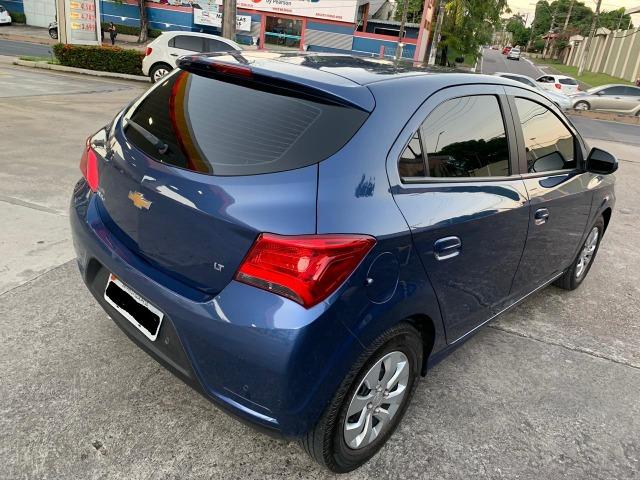 Onix modelo novo lt com my link 10 mil de entrada - Foto 6