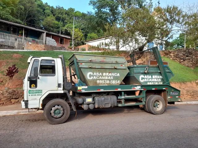Caminhao poliguindaste com 7 caçambas boas