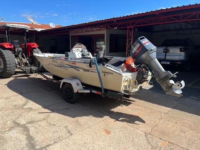 Lancha 17 pés motor 60 hp  com trim 260 horas - Foto 2