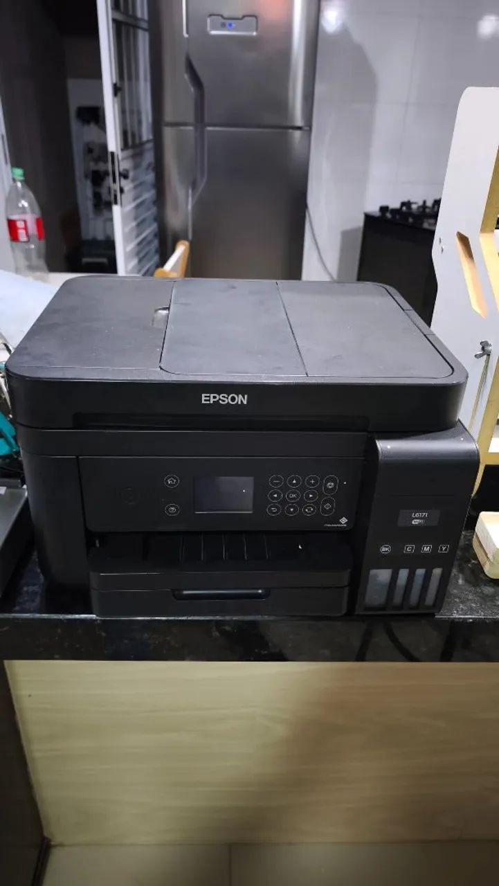 impressora é uma multifuncional Epson EcoTank L6171. 