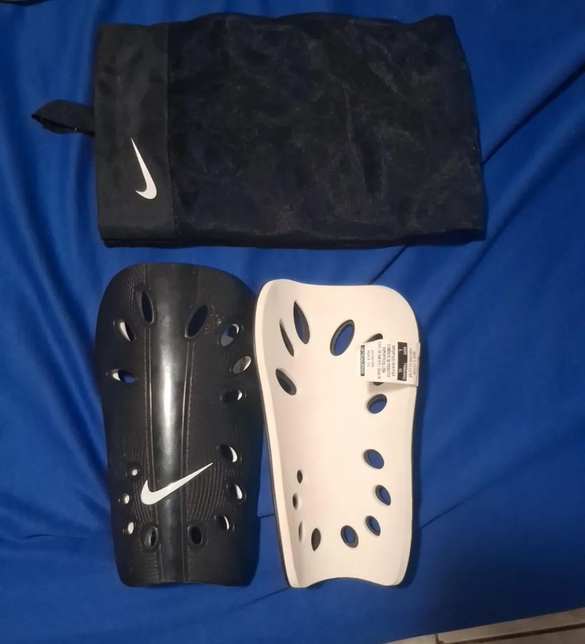 Caneleira Nike