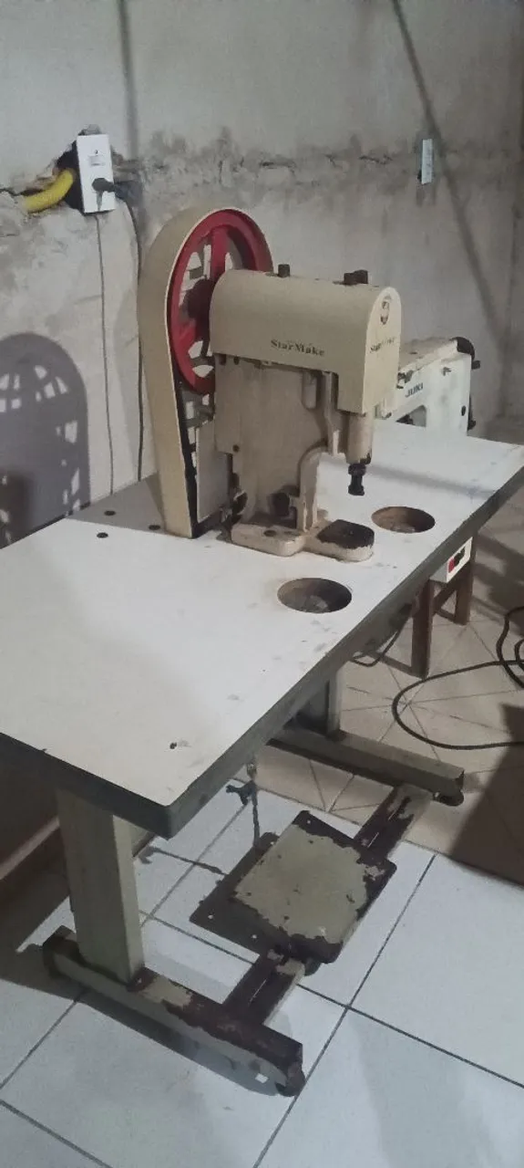 Máquina de botão