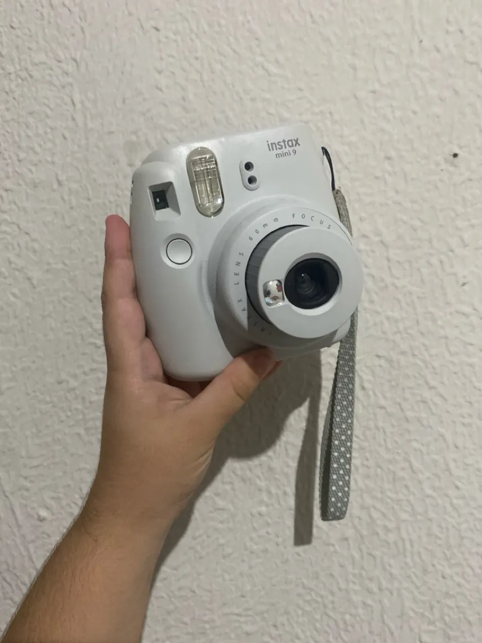 Câmera Instax Mini 9 - Fotos instantâneas e diversão!