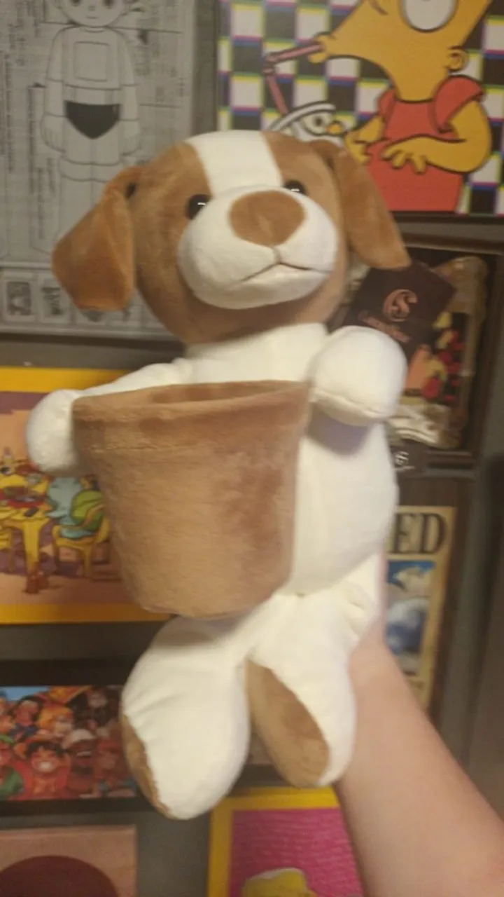 cachorrinho de pelucia cacau show na etiqueta