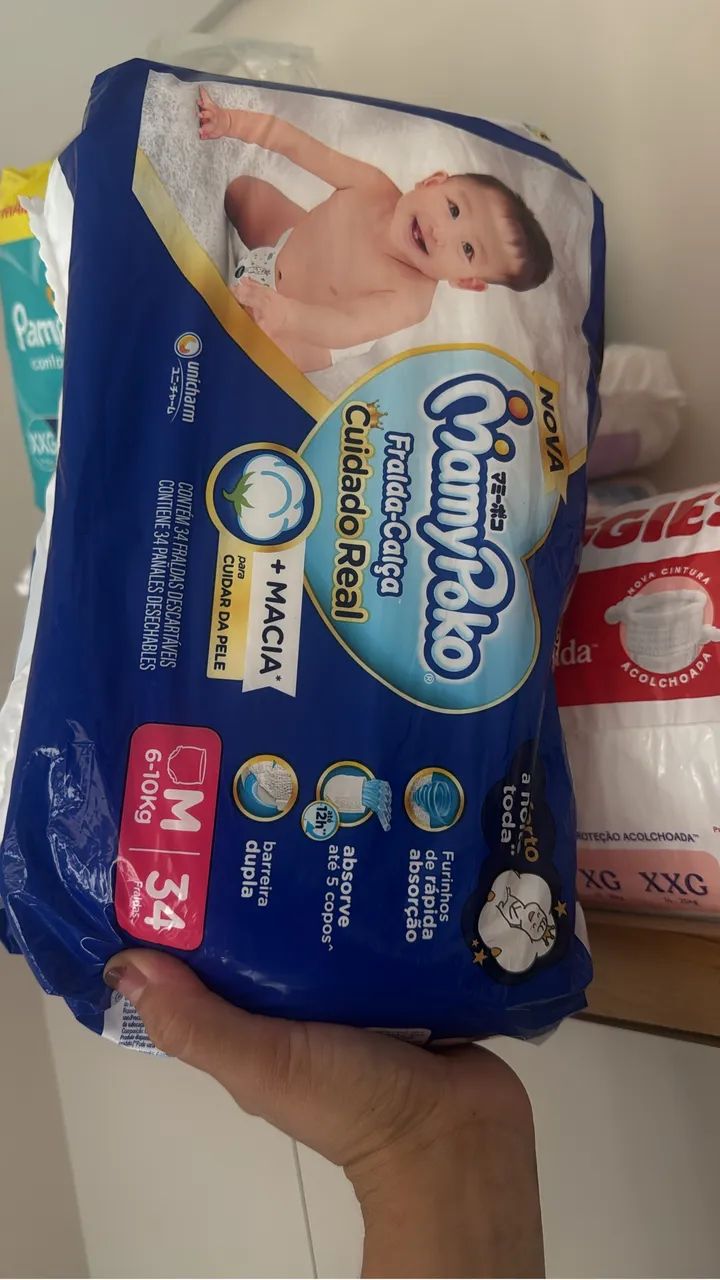 Fraldas descartáveis M - Foto 4